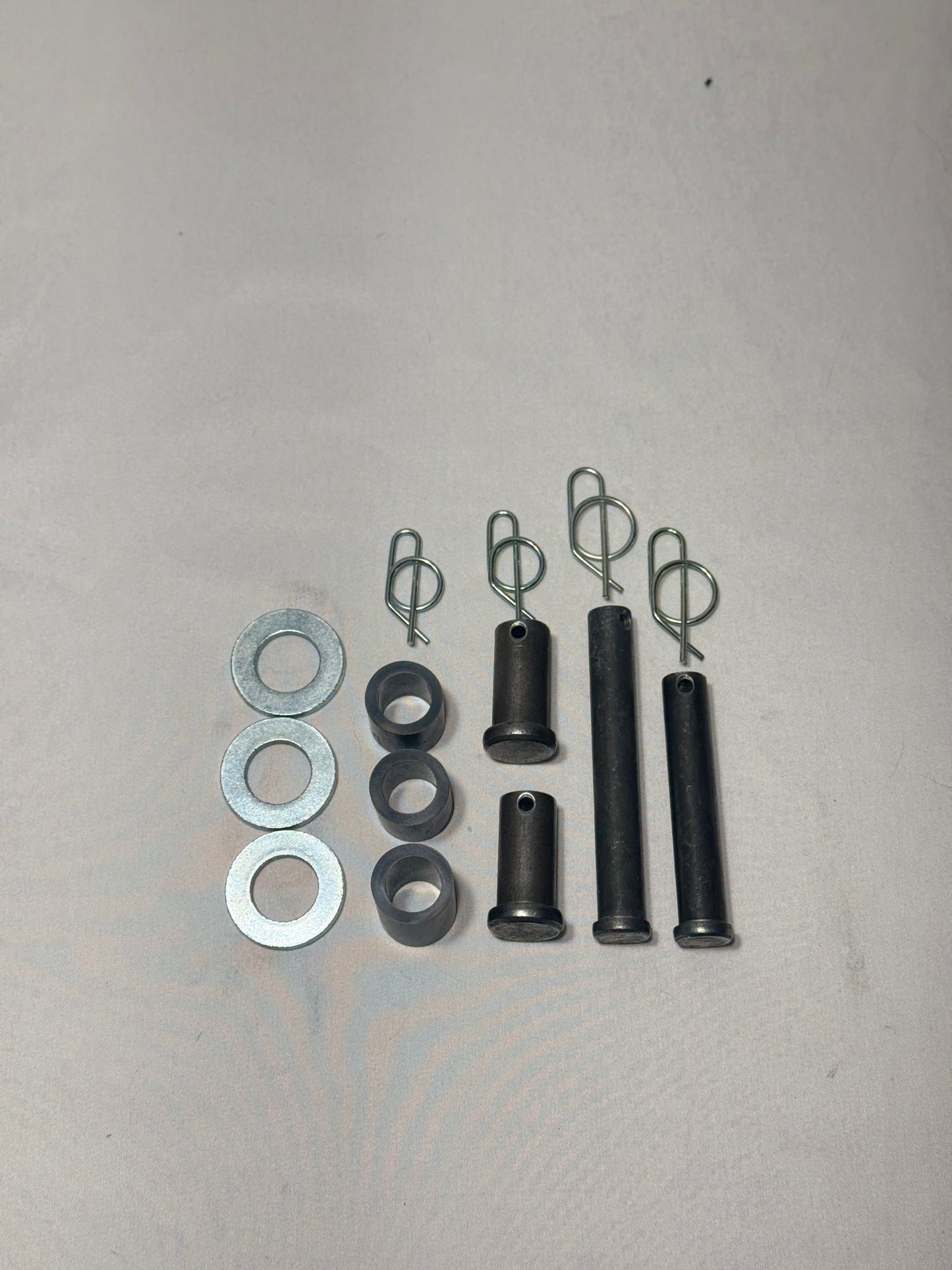 Johnny Bucket Dump actuator pin kit with spacer bushings and clips